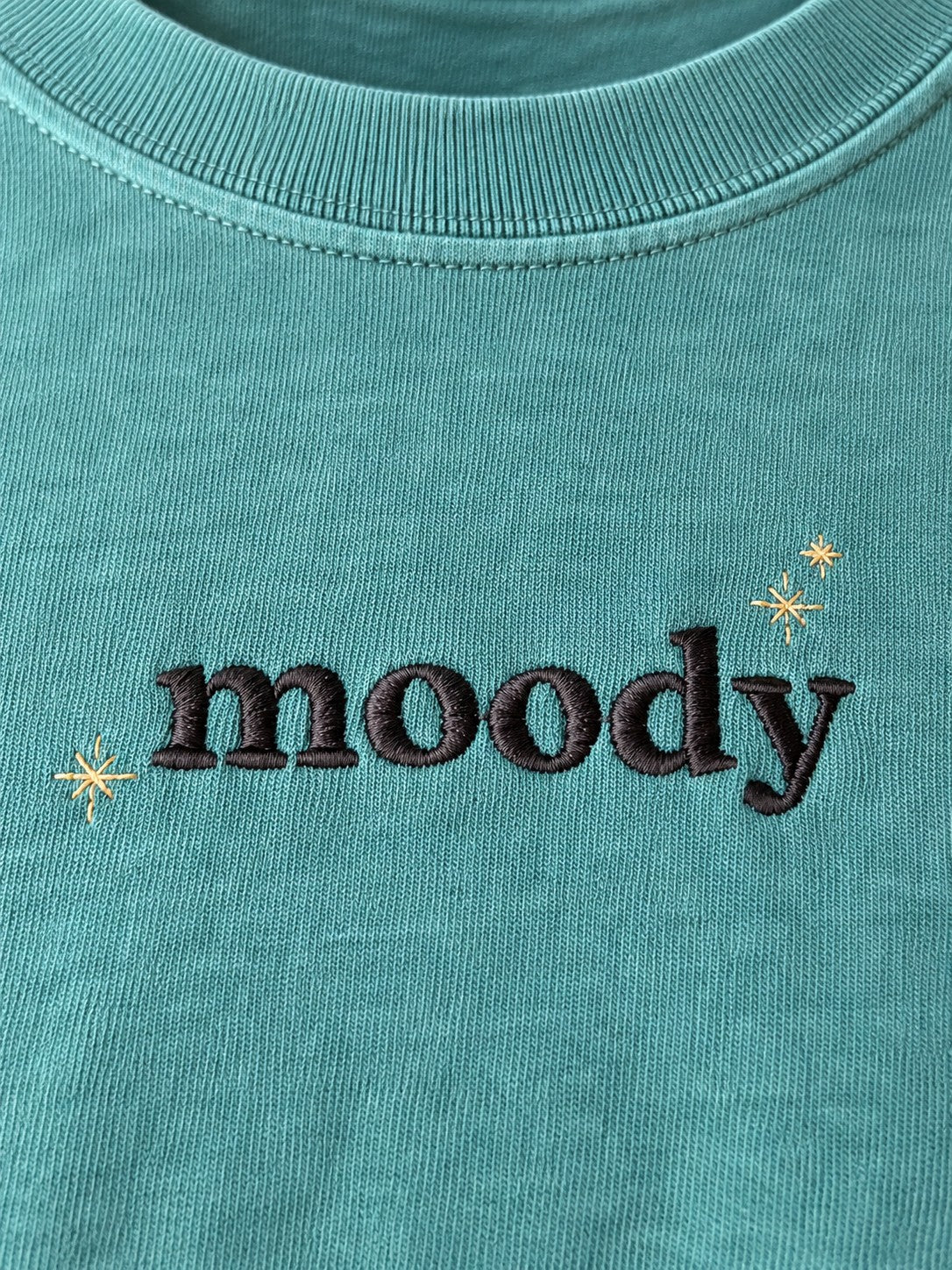 Moody Embroidered Tee – Minimal Script Shirt – close-up detail